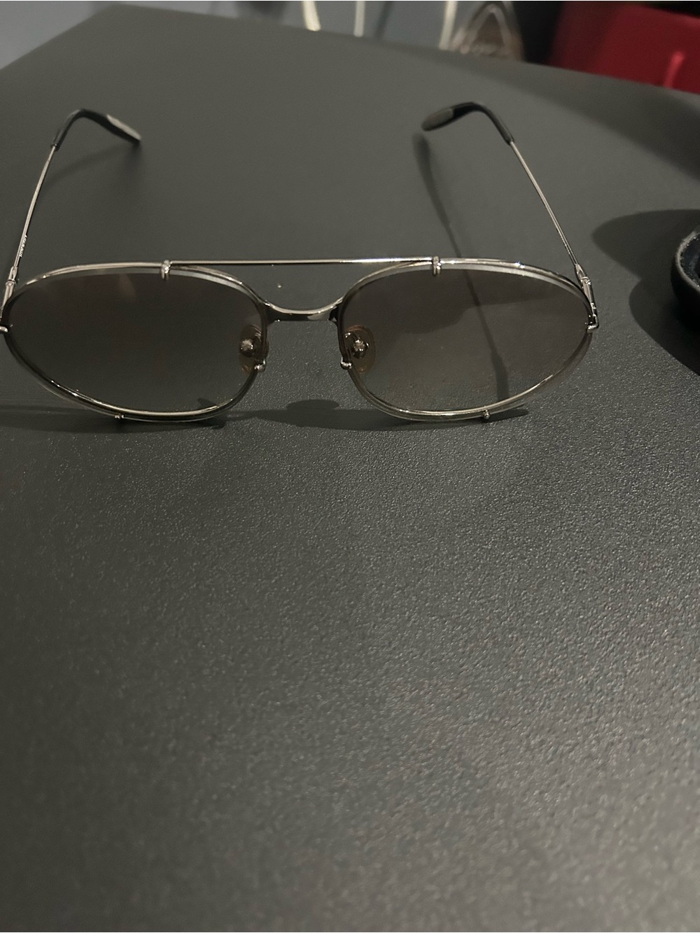 Slim Silver Oval Sunglasses with Gray Tint